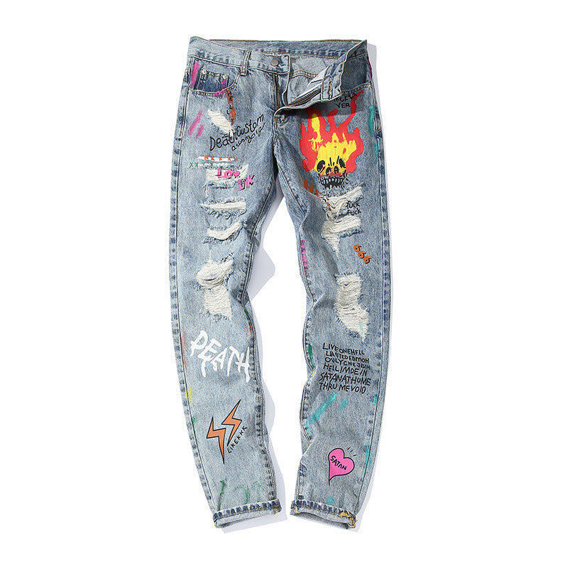 Graffiti print ripped jeans