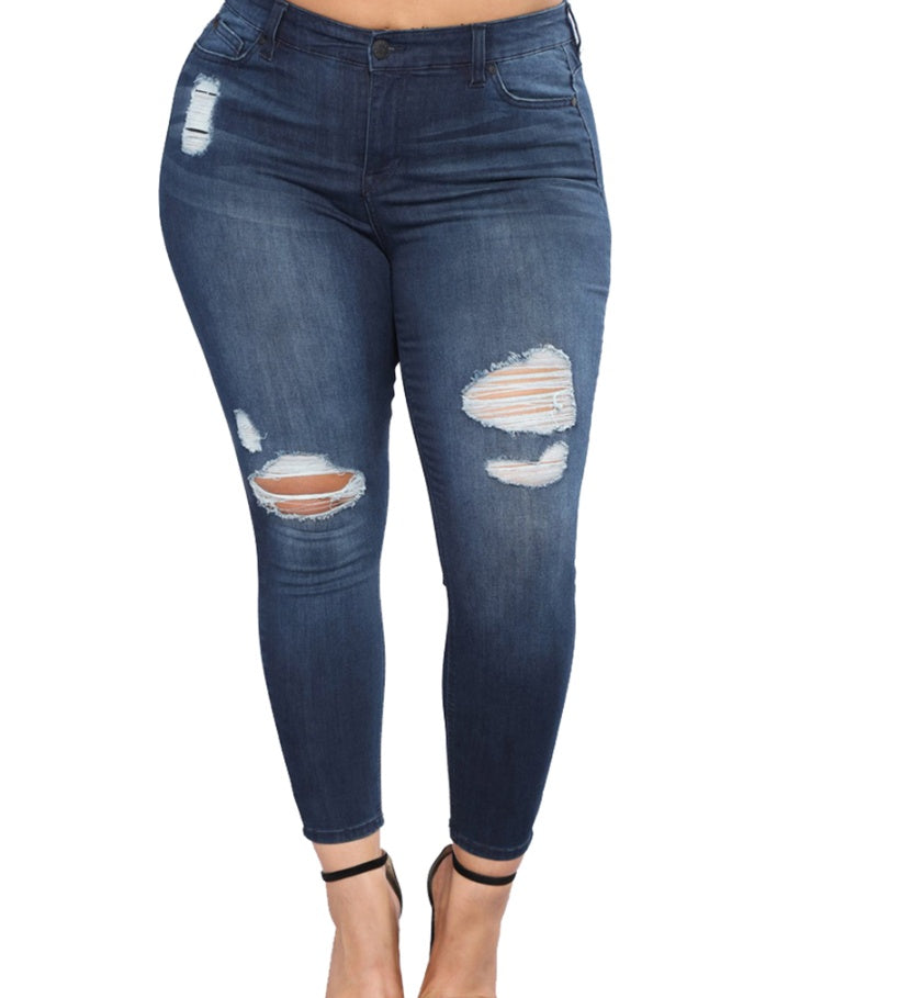 Shredded feet jeans